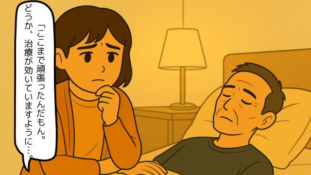 ベッドで眠る夫を祈るように見つめる妻